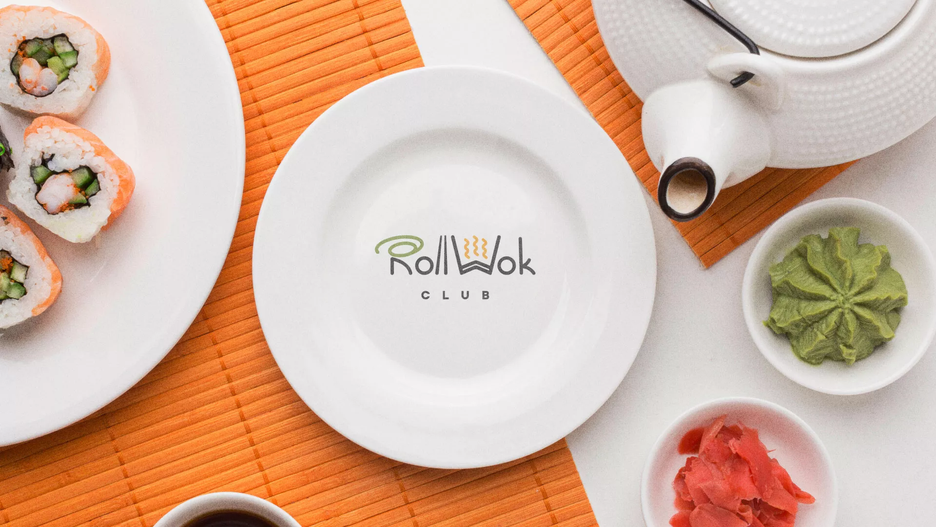 Разработка логотипа и фирменного стиля в Зиме для суши-бара «Roll Wok Club» Разработка логотипа и фирменного стиля в Зиме для суши-бара «Roll Wok Club»